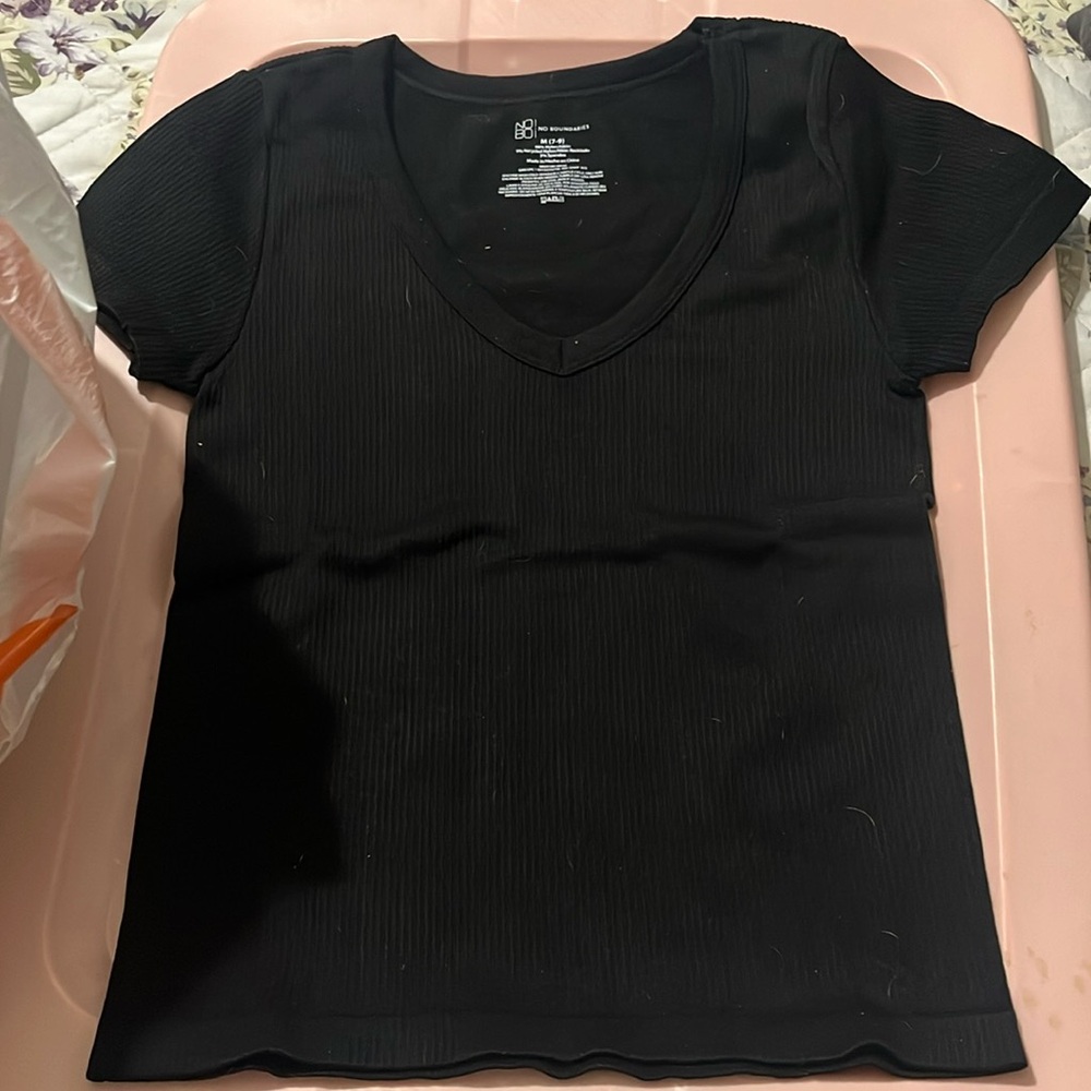 A women black shirt.